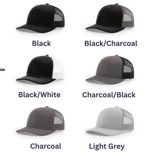 May include: Six trucker hats with mesh backs and solid front panels, displayed in various color combinations including black, black and charcoal, black and white, charcoal and black, charcoal, and light grey, with the text Choice of color.