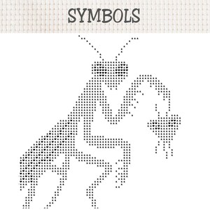 May include: A cross stitch pattern on white fabric featuring the word SYMBOLS at the top. Below, a praying mantis is depicted using a grid of small black stars and heart shapes, creating a detailed silhouette of the insect on a plain background.
