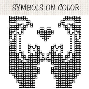 Puede incluir: Un patr&oacute;n de punto de cruz titulado SYMBOLS ON COLOR que presenta un dise&ntilde;o pixelado en blanco y negro de dos manos formando un coraz&oacute;n con un peque&ntilde;o icono de coraz&oacute;n centrado encima, compuesto por diminutos s&iacute;mbolos de corazones.