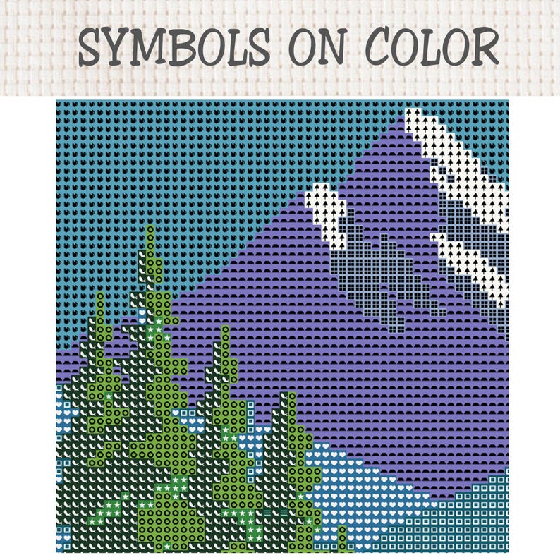 May include: A cross-stitch pattern chart titled SYMBOLS ON COLOR featuring a mountain landscape. The design displays a purple mountain peak with white accents against a blue sky, with green pine trees in the foreground, all rendered in a grid.