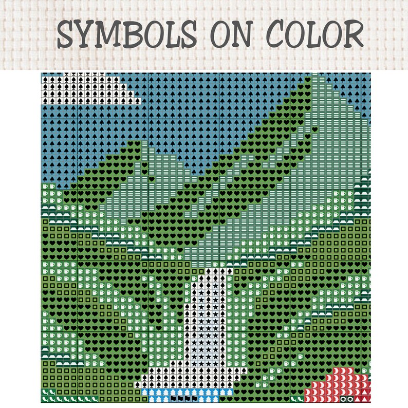 Pu&ograve; includere: Uno schema a punto croce intitolato SYMBOLS ON COLOR che presenta un design paesaggistico basato su griglia. L'immagine mostra una catena montuosa, una cascata centrale e un cielo blu, il tutto reso con vari simboli geometrici in verde e blu.