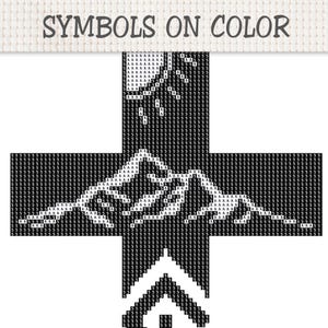 Peut inclure: Un diagramme de point de croix en forme de croix sur un fond quadrill&eacute; blanc avec le texte SYMBOLS ON COLOR en haut. Le motif pr&eacute;sente une grille noire et blanche r&eacute;p&eacute;titive remplie de la lettre A et du chiffre 5 en forme de montagne.