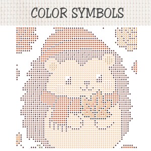 K&ouml;nnte beinhalten: Ein Kreuzstichmuster mit der &Uuml;berschrift COLOR SYMBOLS, das ein Raster aus verschiedenen Symbolen wie Herzen, B&auml;umen, Monden und geometrischen Formen in Braun-, Orange- und Cremet&ouml;nen zeigt, um die Platzierung des Stickgarns zu leiten.