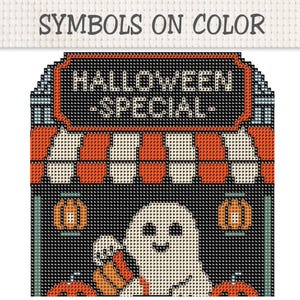 May include: A cross-stitch pattern titled SYMBOLS ON COLOR featuring a HALLOWEEN SPECIAL sign above a striped orange and white awning. Below, a white ghost holds a pumpkin, flanked by two orange lanterns and two additional pumpkins on a black background.