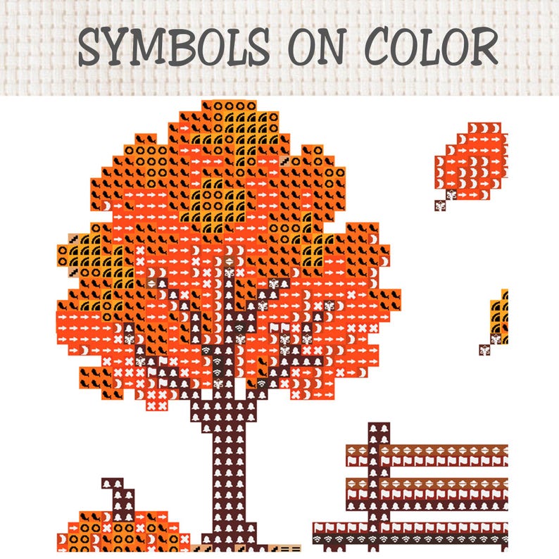 May include: A cross-stitch pattern titled SYMBOLS ON COLOR featuring a pixelated orange tree with a brown trunk, a pumpkin, a fence, and a falling leaf. The design uses various black symbols overlaid on orange and brown blocks to indicate thread colors.