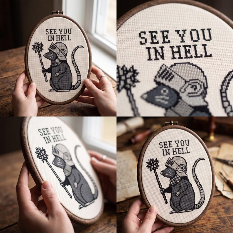 May include: An oval embroidery hoop containing a cross-stitch design on cream fabric. The design features a grey rat wearing a knight's helmet and holding a spiked mace, with the black text "SEE YOU IN HELL" stitched above the figure.