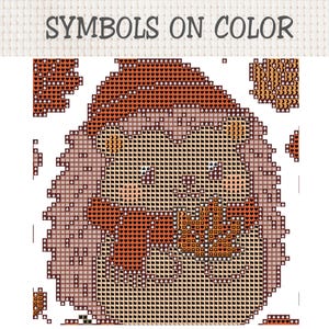 K&ouml;nnte beinhalten: Eine Kreuzstichvorlage mit dem Titel SYMBOLS ON COLOR, die einen Igel mit einem Blatt zeigt. Das Muster verwendet verschiedene geometrische Symbole in Braun-, Orange- und Cremet&ouml;nen, um die zu verwendenden Garnfarben f&uuml;r das Sticken anzugeben.