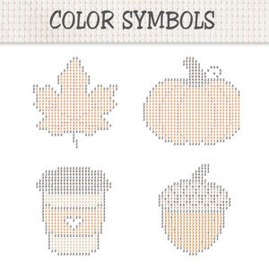 May include: A cross stitch pattern chart titled COLOR SYMBOLS featuring four autumn-themed designs: a maple leaf, a pumpkin, a coffee cup, and an acorn. Each shape is composed of a grid of numbers and letters representing specific thread colors.