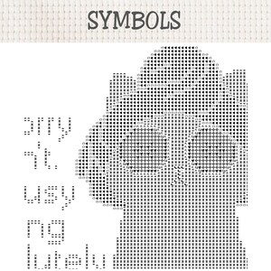 May include: A black and white cross stitch pattern chart featuring the word SYMBOLS at the top. The design consists of a grid filled with various black geometric symbols, including triangles, circles, and squares, arranged to form a specific shape.