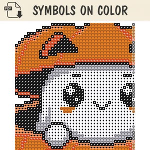 May include: A cross stitch pattern chart titled SYMBOLS ON COLOR featuring a grid of orange, black, and white squares. The design displays a character with a large orange head, black hair, and a white face with black eyes and a small smile.