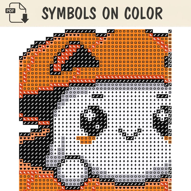 May include: A cross stitch pattern chart titled SYMBOLS ON COLOR featuring a grid of orange, black, and white squares. The design displays a character with a large orange head, black hair, and a white face with black eyes and a small smile.