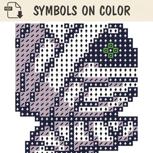 May include: A digital cross-stitch pattern titled SYMBOLS ON COLOR featuring a pixelated grid design. The pattern uses dark blue, light purple, and white squares marked with black arrow and stair symbols, plus a small green square icon.