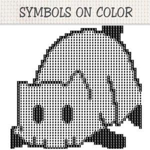 May include: A cross-stitch pattern chart titled SYMBOLS ON COLOR, featuring a grid of black spade symbols and the number 1 on a white background. The design forms a rounded shape with a flat base, utilizing a repeating grid layout for embroidery.