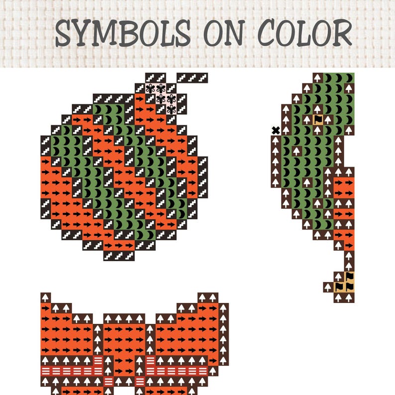 May include: A cross stitch pattern chart titled SYMBOLS ON COLOR featuring three distinct pixelated designs. The graphics include a round ornament, a curved shape, and a bow, all rendered in orange and green blocks with black symbols.