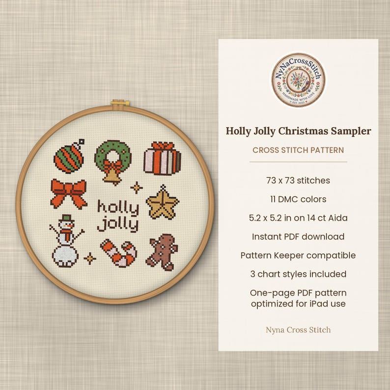 May include: A cross stitch pattern titled Holly Jolly Christmas Sampler in a wooden hoop. The design features a snowman, wreath, gift, star, bow, candy cane, and gingerbread man. Text includes 73 x 73 stitches, 11 DMC colors, and 5.2 x 5.2 in on 14 ct Aida.