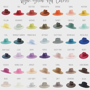 May include: A selection of vegan suede hats in a spectrum of colours, such as Merlot, Red, and Rust Red. The hats are neatly arranged, displaying shades from Orange to Black. The text "Vegan Suede Hat Colors" is displayed at the top.