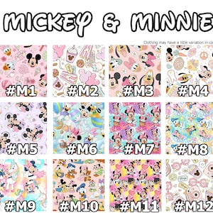 May include: Twelve different fabric designs featuring Mickey Mouse and Minnie Mouse in various poses and settings. The designs include a pink and white floral pattern, a blue and white Easter egg pattern, and a pink and white cupcake pattern. The designs are labeled with numbers from M1 to M12.