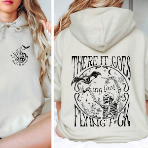 There It Goes My Last Flying F*ck Hoodie Woman Halloween tee Skeleton Hand Halloween Matching Spooky Vibes  Halloween Gift Skeleton Hoodie