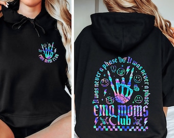 May include: Black hoodie with a rainbow holographic design featuring a skeleton hand with the text "It was never a phase Emo Moms Club" on the back.