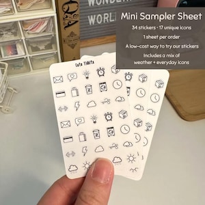 May include: A white sticker sheet labeled Cute Tidbits featuring 34 black line art icons including envelopes, hearts, lightbulbs, alarm clocks, boxes, credit cards, shopping bags, coffee cups, washing machines, clocks, dumbbells, lightning bolts, and clouds.