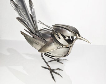 Metal bird sculpture "Flip"