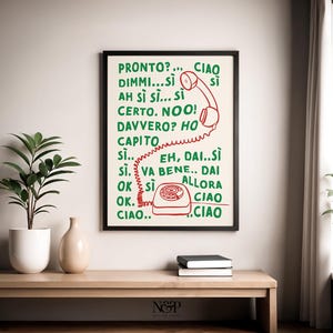 May include: A black framed print with a white background and green text. The text says "PRONTO?... CIAO DIMMI...SI AH S&Igrave; SI... SI CERTO. NOO! DAVVERO? HO CAPIT&Ograve; SI... EH, DAI..SI S&Igrave;. VA BENE.. DAI OK SI ALLORA OK. CIAO.. CIAO" with a red rotary phone illustration.
