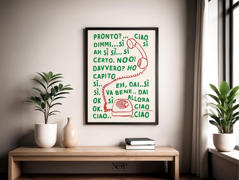 May include: A black framed print with a white background and green text. The text says "PRONTO?... CIAO DIMMI...SI AH S&Igrave; SI... SI CERTO. NOO! DAVVERO? HO CAPIT&Ograve; SI... EH, DAI..SI S&Igrave;. VA BENE.. DAI OK SI ALLORA OK. CIAO.. CIAO" with a red rotary phone illustration.