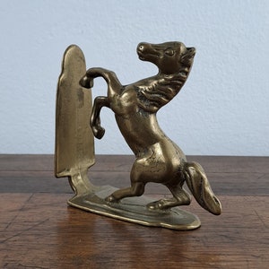 Antique single bronze prancing horse book-end