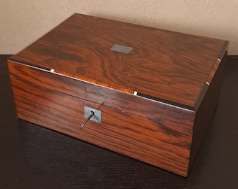 Antique wooden lockable box with a wooden inlay