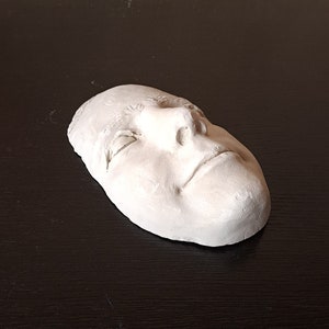 Unique smaller heavy plaster face cast of unknown subject