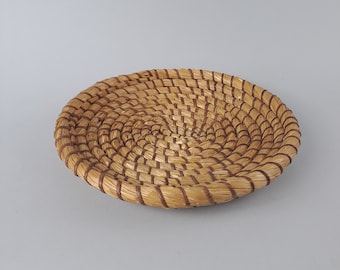 Mid sized round shallow decorative handwoven basket/bowl