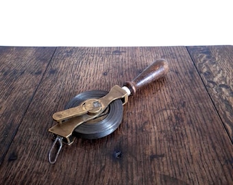 Heavy antique metal and wood 20m tape measure