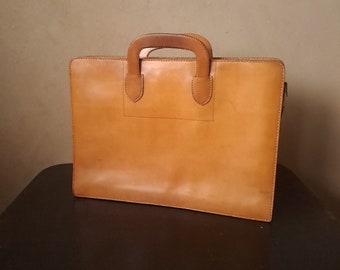 Sac de transport robuste vintage en cuir riche des années 70