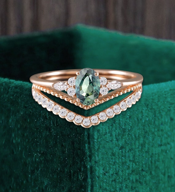 Oval Cut Teal Sapphire Rose Gold Bridal Set Marquise Cut