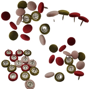 May include: Assortment of upholstery tacks in red, green and pink velvet. The tacks have a silver finish and are used for furniture upholstery.