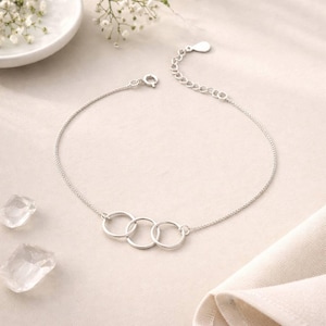 Pulseira de três anéis em prata esterlina: círculos entrelaçados de gerações