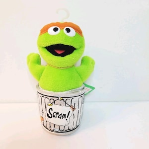 May include: A set of three ceramic nesting bowls in shades of blue, green, and white. The bowls have a speckled glaze and a simple, modern design. The largest bowl is about 15 cm in diameter.