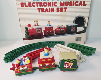 Juguete musical navideño vintage a pilas, con pistas para coches, caja de repuesto solamente. LEER