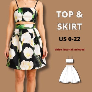 Può includere: Un completo a due pezzi composto da un top corto con spalline e una gonna svasata, entrambi su sfondo nero con stampa floreale di tulipani bianchi e verdi. Il testo riporta TOP & SKIRT, US 0-22, Video Tutorial Included, con un disegno.