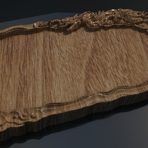 May include: A wooden tray with a decorative carved border featuring a dragon design. The tray is made of light brown wood with a natural grain pattern.