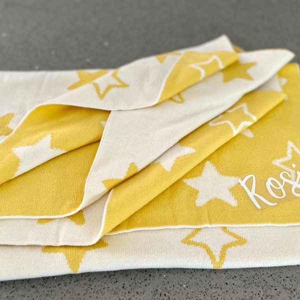 A Stylish Personalised Unisex Baby Blanket. A Reversible Blanket with a Yellow & White Star Pattern. Personalise with a Name of your Choice.