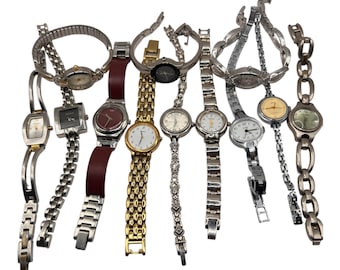 May include: A collection of various women's wristwatches. The watches feature different band styles, including metal link, leather, and chain designs. The watch faces are round, square, and oval, with silver, gold, and black tones.