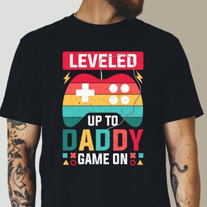 Leveled Up to Daddy - Funny Dad Shirt - New Father Gift - Matching Father - Fathers Day - Gift For Husband - Gamer Dad Gift - Daddy Tee
