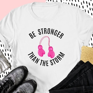 Be Stronger Than The Storm Shirt, Cancer Awareness Shirt, Motivational Cancer Shirt, Pink October Shirt, Strong Women Gifts, Cancer Shirt