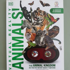 May include: A book titled Virtual Reality Animals! The Animal Kingdom As You've Never Seen It Before, featuring a collage of various animals including a tiger, zebra, fox, koala, and owl, with a black virtual reality headset graphic at the bottom.