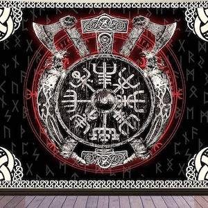 May include: Black and white tapestry featuring a Viking shield, axes, and a hammer in the centre. The background is black with red runes and a white border.