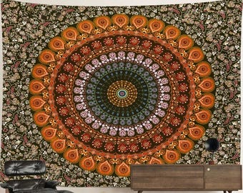 May include: A large, colorful tapestry featuring a detailed mandala design. The mandala is a circular pattern with shades of orange, brown, green, and blue. The background is dark with floral patterns, creating a vibrant and decorative wall hanging.