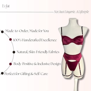 May include: A deep burgundy satin lingerie set on a mannequin, featuring a balconette bra and a high-waisted garter belt with attached straps. The image includes text: Eclat, Not Just Lingerie. A Lifestyle, Made-to-Order, Made for You, 100% Handcrafted Excellence, Natural, Skin-Friendly Fabrics, Body-Positive & Inclusive Design, Perfect for Gifting & Self-Care.