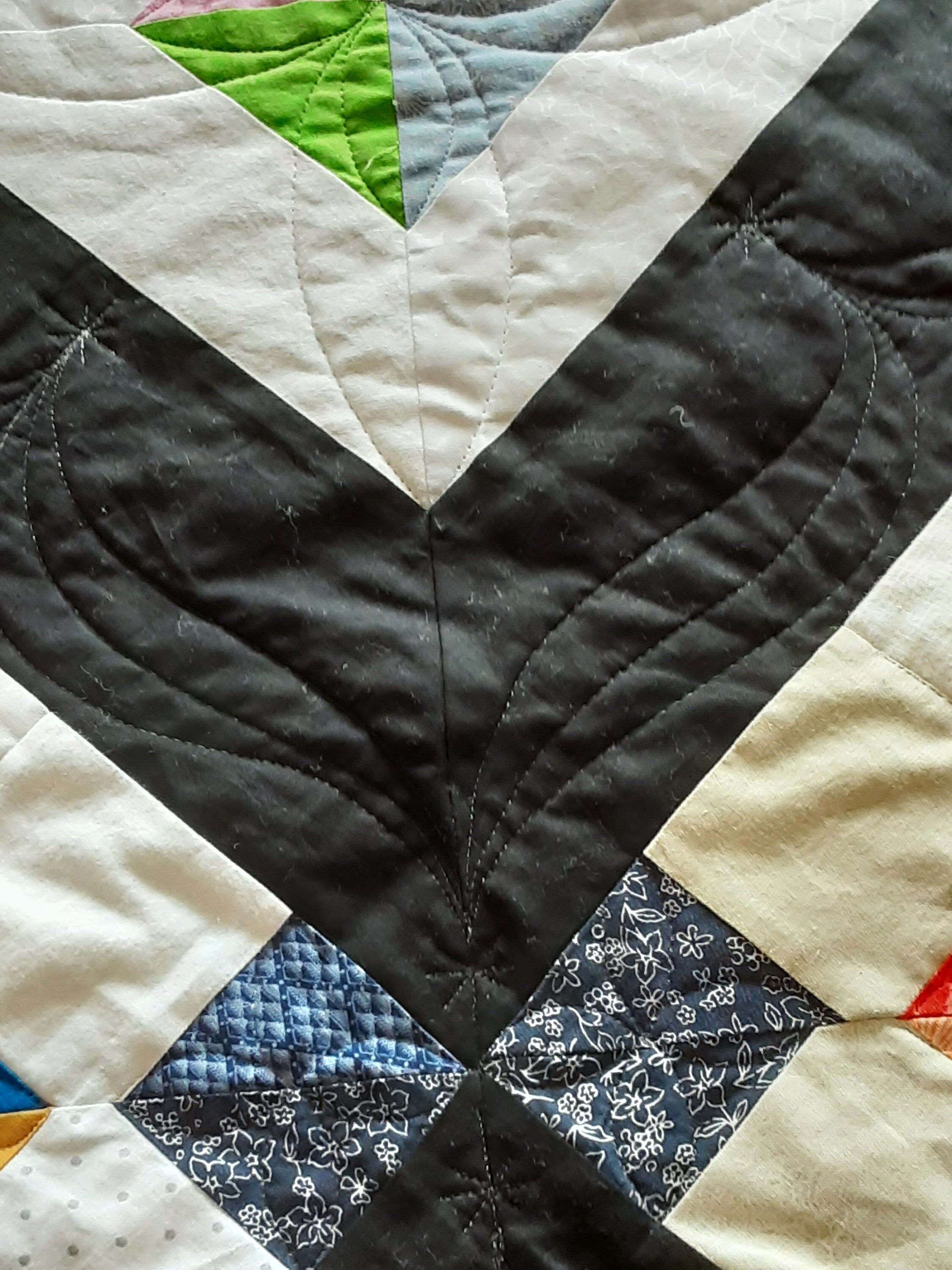 handmade-black-and-white-diamond-quilt-which-measures-approximately-83