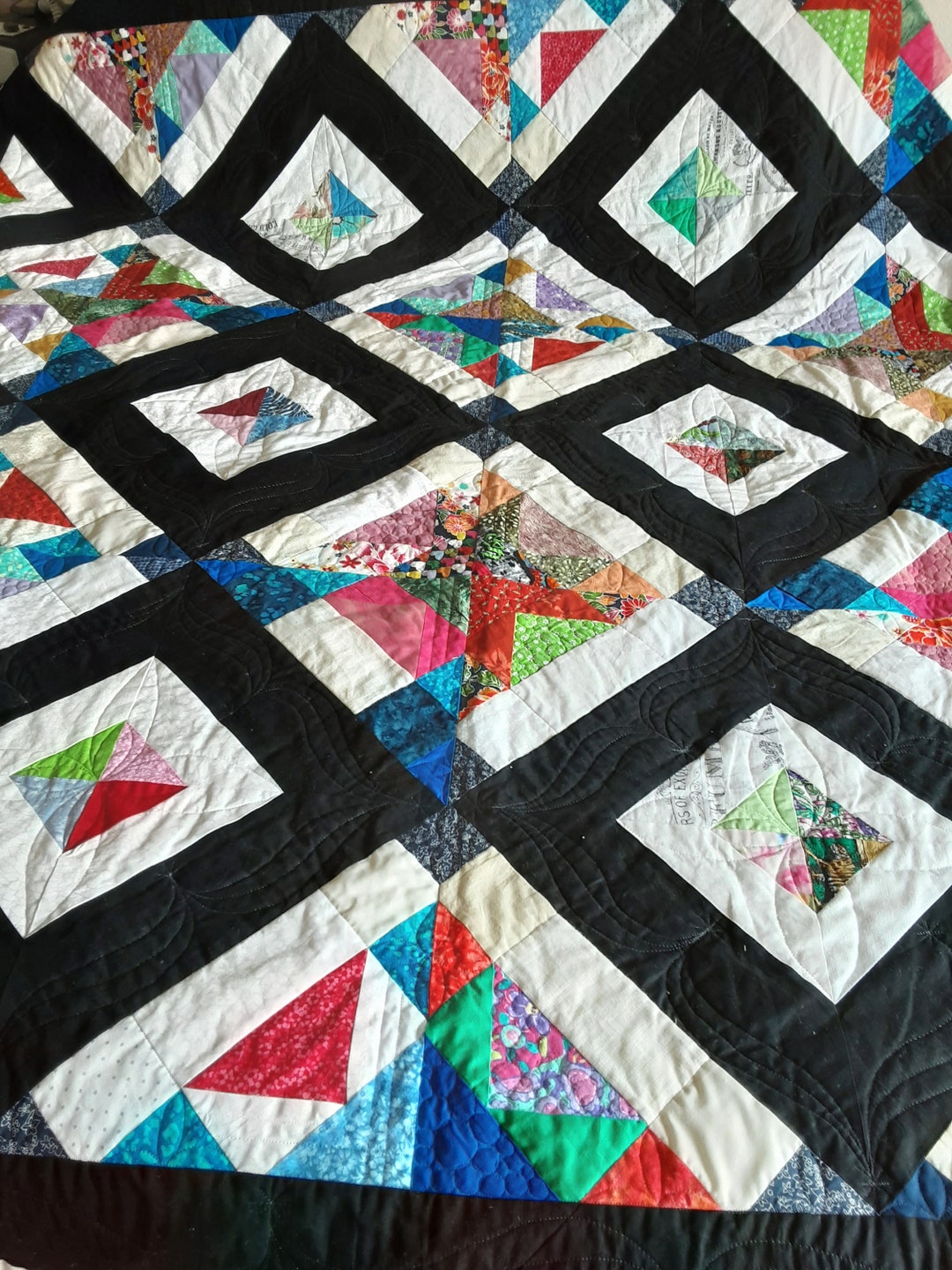 handmade-black-and-white-diamond-quilt-which-measures-approximately-83